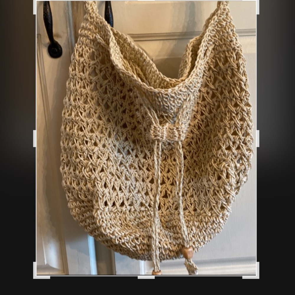 Macrame purse with shoulder strap.  14”x14”